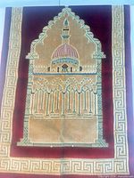 Full view of prayer rug displaying overall design and border