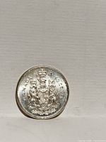 Reverse side of 1962 Canadian 50-cent silver coin