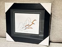 Front view of framed print with protective corner guards