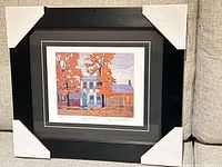 Framed print with protective corner covers