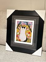 Front view of framed limited edition Maud Lewis cat lithograph