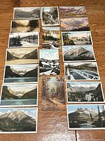 Overview of all postcards laid out on floor
