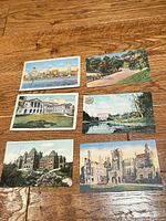 Six vintage Toronto postcards laid out on wooden surface