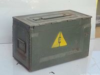 Side view showing hazard symbol and rust