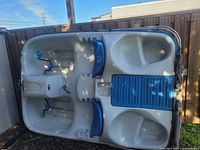 Full view of underside and seating of Pelican pedal boat
