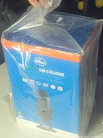 Front view of sealed retail box showing Blue microphone image and branding
