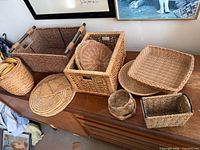 overview of all baskets and trays on sideboard