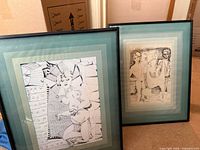 Both framed etchings standing side by side