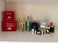 Group shot showing all fragrance bottles and Old Spice shaving mugs