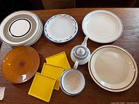 Group shot of all dinnerware pieces on table