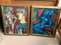 Both framed paintings side by side showing overall size and frames