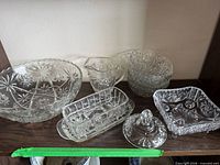all glass items displayed on shelf