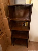 full front view of four-shelf wood unit