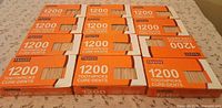 Twelve Montini toothpick boxes arranged on table