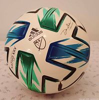 Full view of Adidas NATIVO XXV mini match ball showing graphics and logos