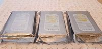 Three hard drives sealed in anti-static bags