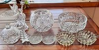 Full view of all nine crystal pieces arranged on table