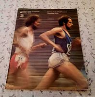 Front cover of the 1976 Montreal Olympics Athletics magazine showing runners and bilingual titles