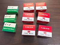 Nine boxed panel meters, six Flash Star red-white boxes and three C+C green-white boxes