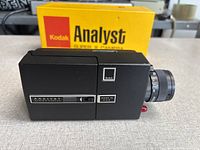 Kodak Analyst Super 8 camera front/side view with original yellow box