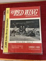 Front cover of 1962-63 Detroit Red Wings program in sleeve
