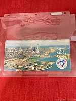 Front view of 1977 Toronto Blue Jays Media Guide booklet inside a clear sleeve