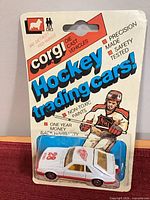 Front view of sealed Corgi Hockey Trading Cars blister card with Mustang Cobra die-cast inside