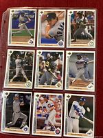 Fronts of nine Upper Deck baseball cards in binder page
