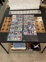 Table layout showing binder sheet with 32 cards, 16 gold foil packs and 10 white packs