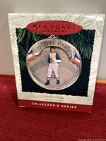 Front of boxed Hallmark Keepsake Ornament showing Satchel Paige medallion and 1996 Collector's Series labeling