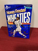 Front of unopened Honey Frosted Wheaties box with Ken Griffey Jr image and signature