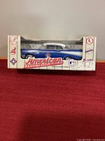 Front of boxed 1957 Chevrolet die-cast bank showing American Pastime branding and Toronto Blue Jays logo