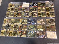 All three complete McDonald’s Upper Deck 1998-99 card sets displayed in plastic sheets, showing round Ice cards, Gretzky Teammates, Gretzky Grand Moments