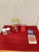 Front view of all five items on red surface