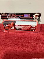 Front view of boxed die-cast Detroit Red Wings tractor trailer