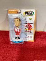 Front view of sealed Upper Deck Play Makers Steve Yzerman bobblehead package showing figure and card