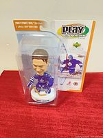 Front view of sealed Curtis Joseph Play Makers bobblehead package