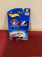 Front of sealed Hot Wheels Blue Jays Pontiac Grand Prix blister pack