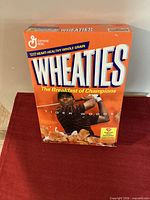 Front view of 2004 Wheaties cereal box featuring Tiger Woods artwork
