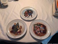 All three plates, years visible
