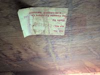 Manufacturer label underside of shelf