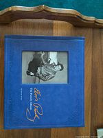 Blue hardcover book Elvis Presley: The Family Album