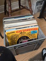Front view of crate showing multiple LPs with Gay Nineties record facing forward