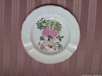 Top view of Royal Worcester Enchantment ashtray showing floral pattern and rim condition
