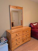 Low dresser with attached mirror