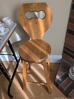 Front view of oak bar stool