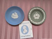 Front view of both plates and brochure
