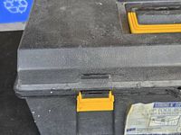 Toolbox exterior showing one yellow latch and label