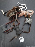 group view of winch, strap, three rollers with brackets