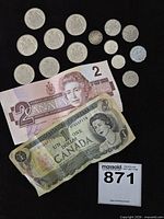 Overview showing both banknotes and all coins